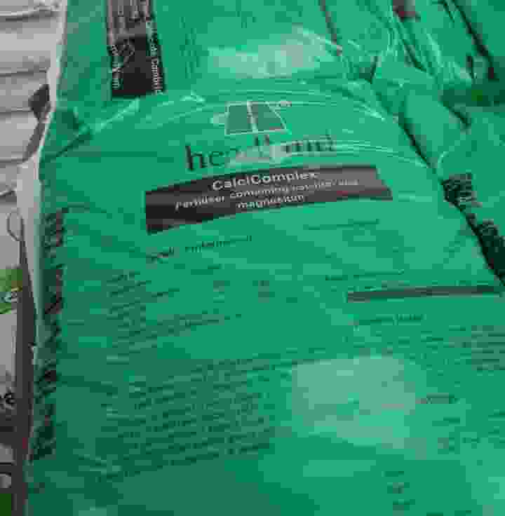 This image is of a bagged product that we use on waterlogged lawns within our lawn care service