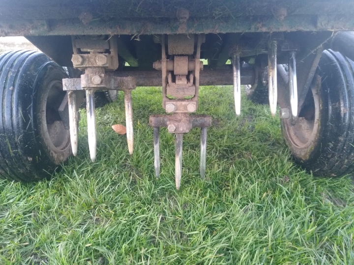 This image is of a close up of lawn aerator spikes. Aeration is a key part on lawn care services