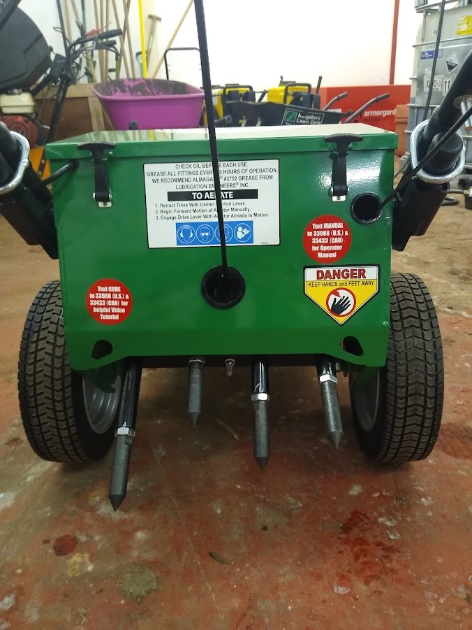 This image is of a new lawn aeration machine ready to carry our lawn repairs and lawn renovations