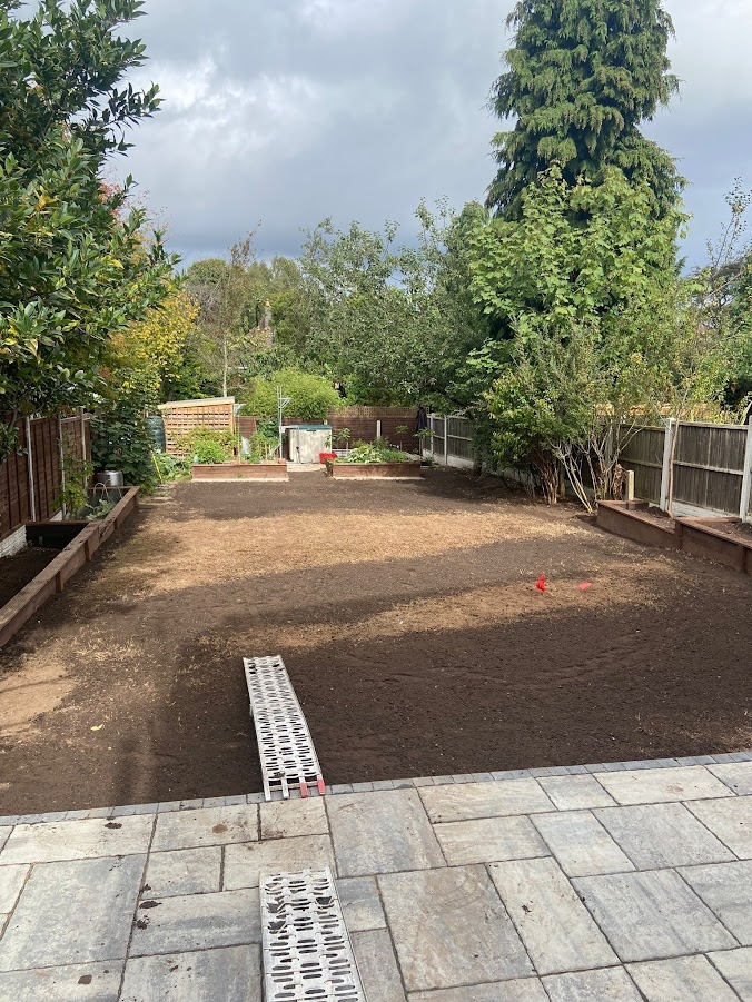 This image is of lawn repair in full swing from our lawn experts