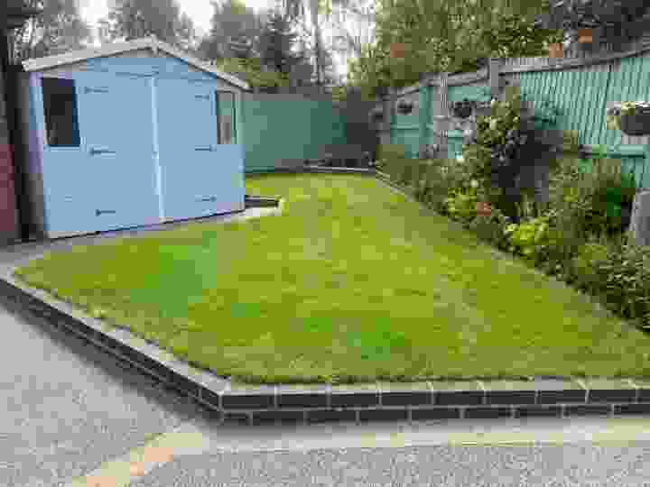 A small rear lawn following lawn treatment | Kingsbury Lawn Care